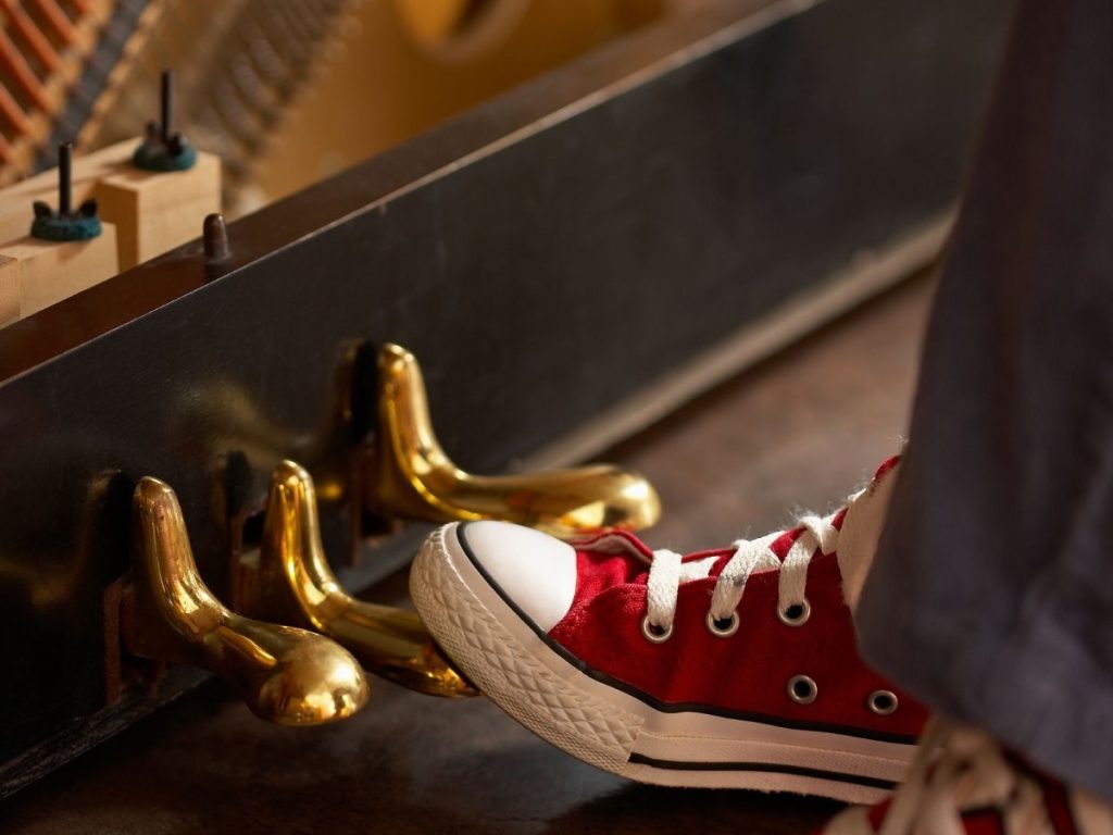 Piano middle pedal, and what three of them are about Luxury Pianos Inc.